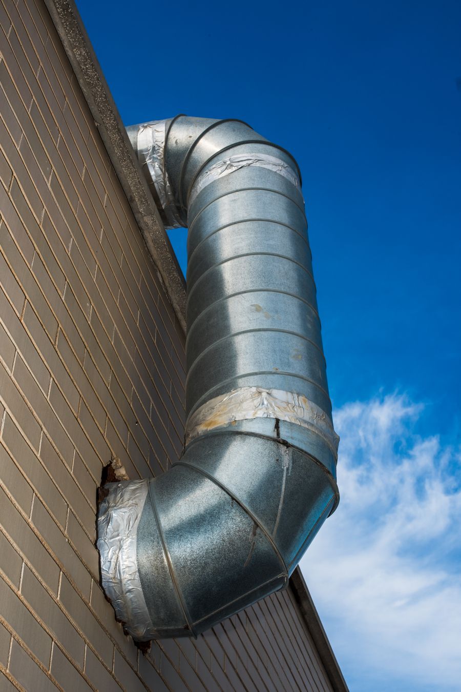Ductwork installed on the exterior of a building